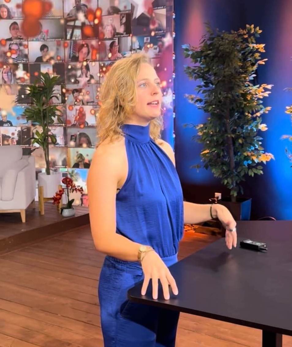 Speaking on stage in front of an audience